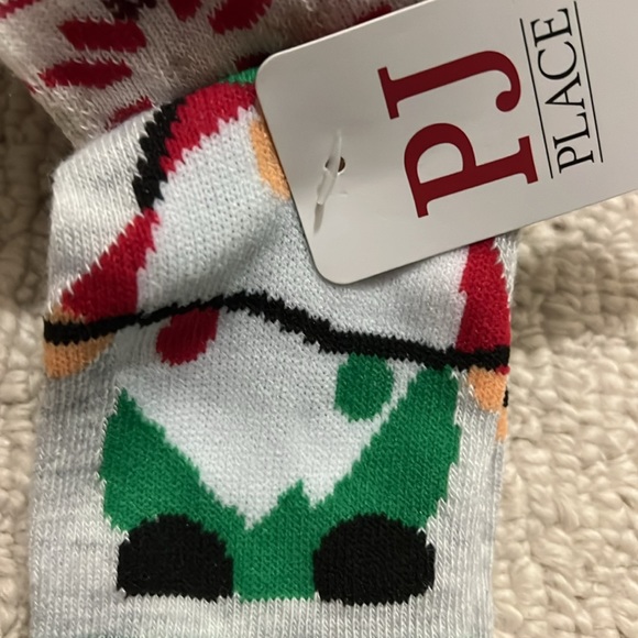 NWT - 3 pairs of socks with grips on bottom. Size 12-24 months. - Picture 5 of 7